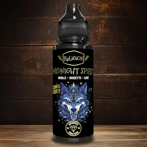 E-liquide Midnight Spirit King Edition de Religion Juice, bouteille avec étiquette colorée et bouchon noir, vue en gros plan.